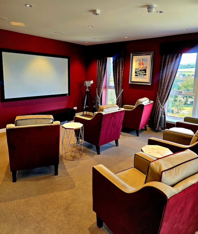 cinema room with red seats